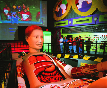 Visitors observe Tess, a 50-foot body simulator, in action