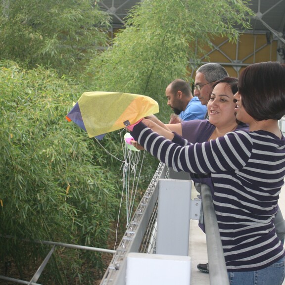 Teachers participating in hands-on activity in the Wallis Annenberg Building.