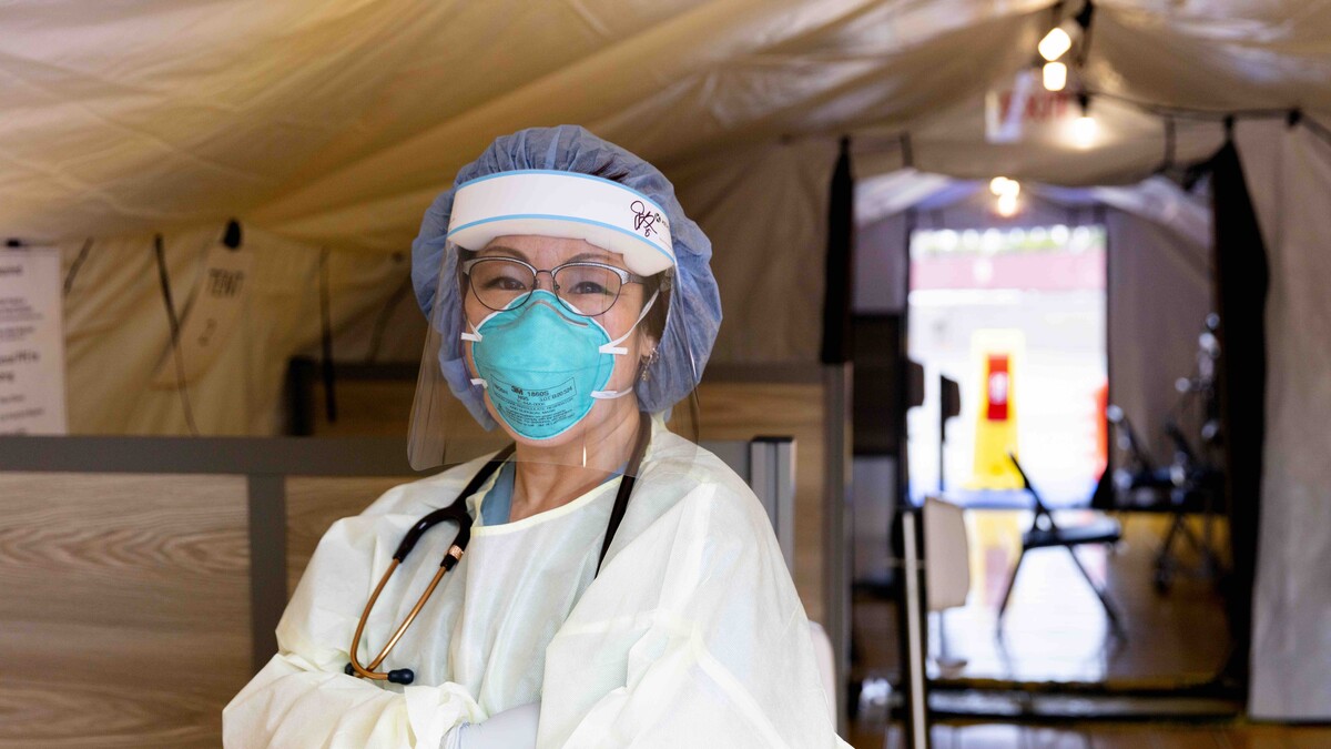 Michiko Matsue, emergency department nurse at Cedars-Sinai Marina del Rey Hospital, stands in a temporary triage tent