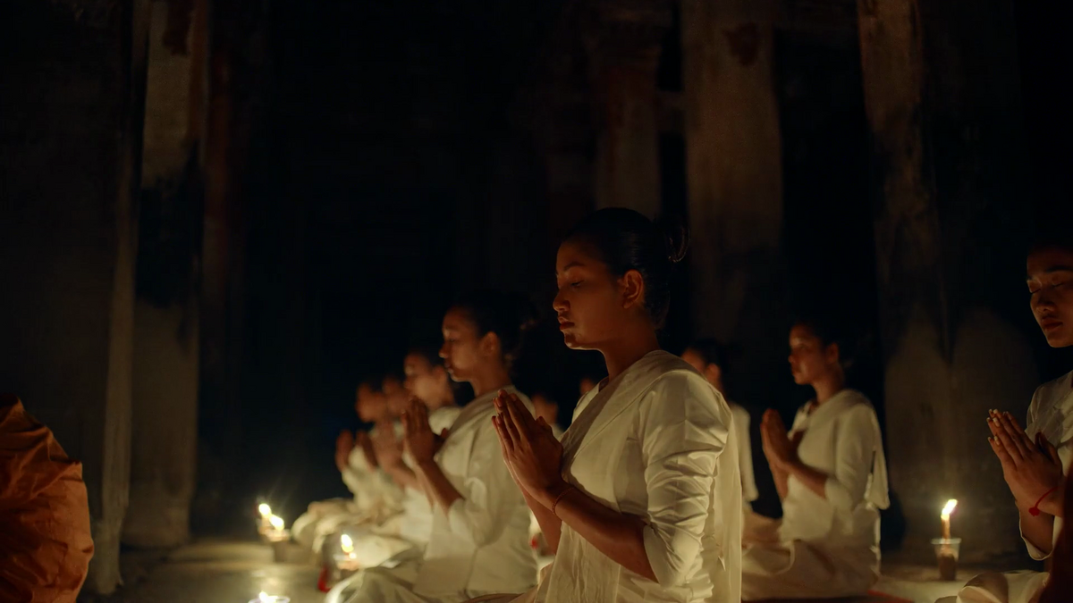 Buddhists praying in temple in Angkor 3D movie