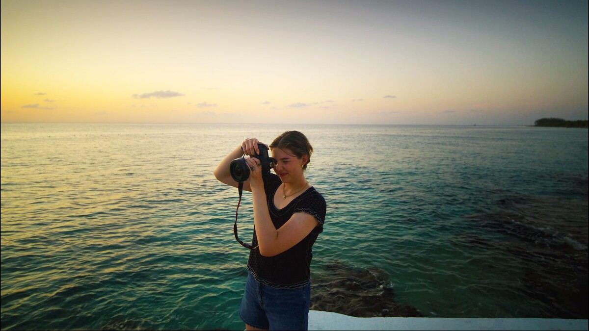 Photo of Emily Whitehead photographing the ocean.