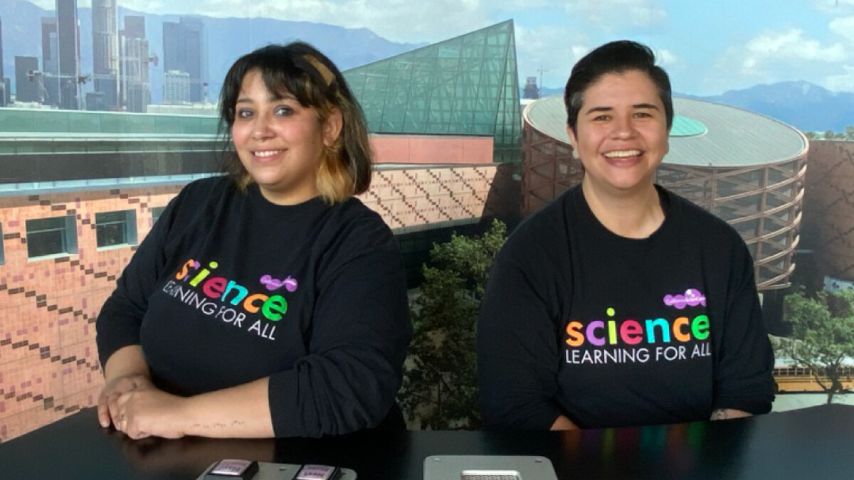 Hosts Monica and Mariela with Fun Lab TV logo