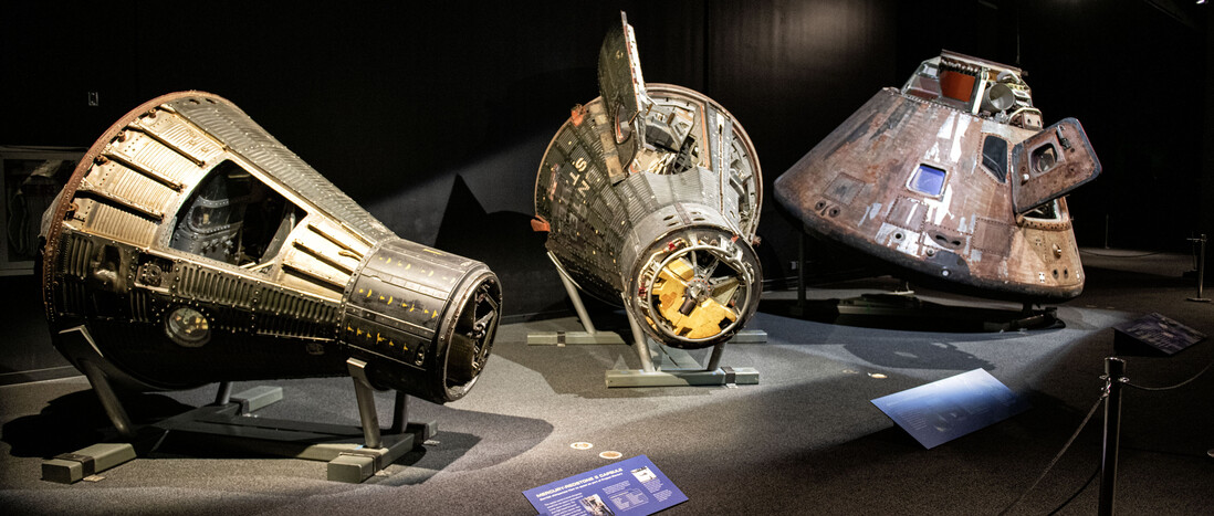 Photo shows L-R: Mercury-Redstone 2 Capsule*, Gemini 11 Capsule* and Apollo Soyuz Command Module*   * All three capsules are on loan from the National Air and Space Museum, Smithsonian Institution. ** On loan from Lockheed Martin Corporation
